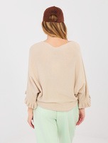 Pastelowy sweter oversize o kroju nietoperza