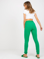 Zelené dámské kalhoty na cvičení slim fit.