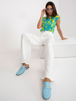 Białe szerokie spodnie garniturowe z kieszeniami