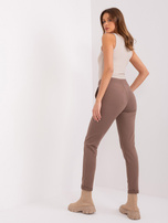 Hurt brown sweatpants with straight legs.