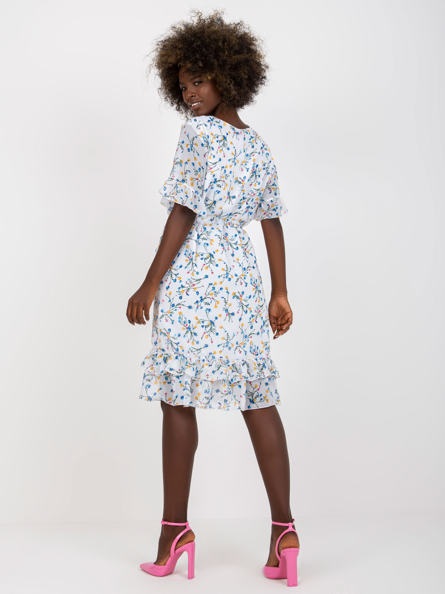 White midi dress with floral pattern and flounces