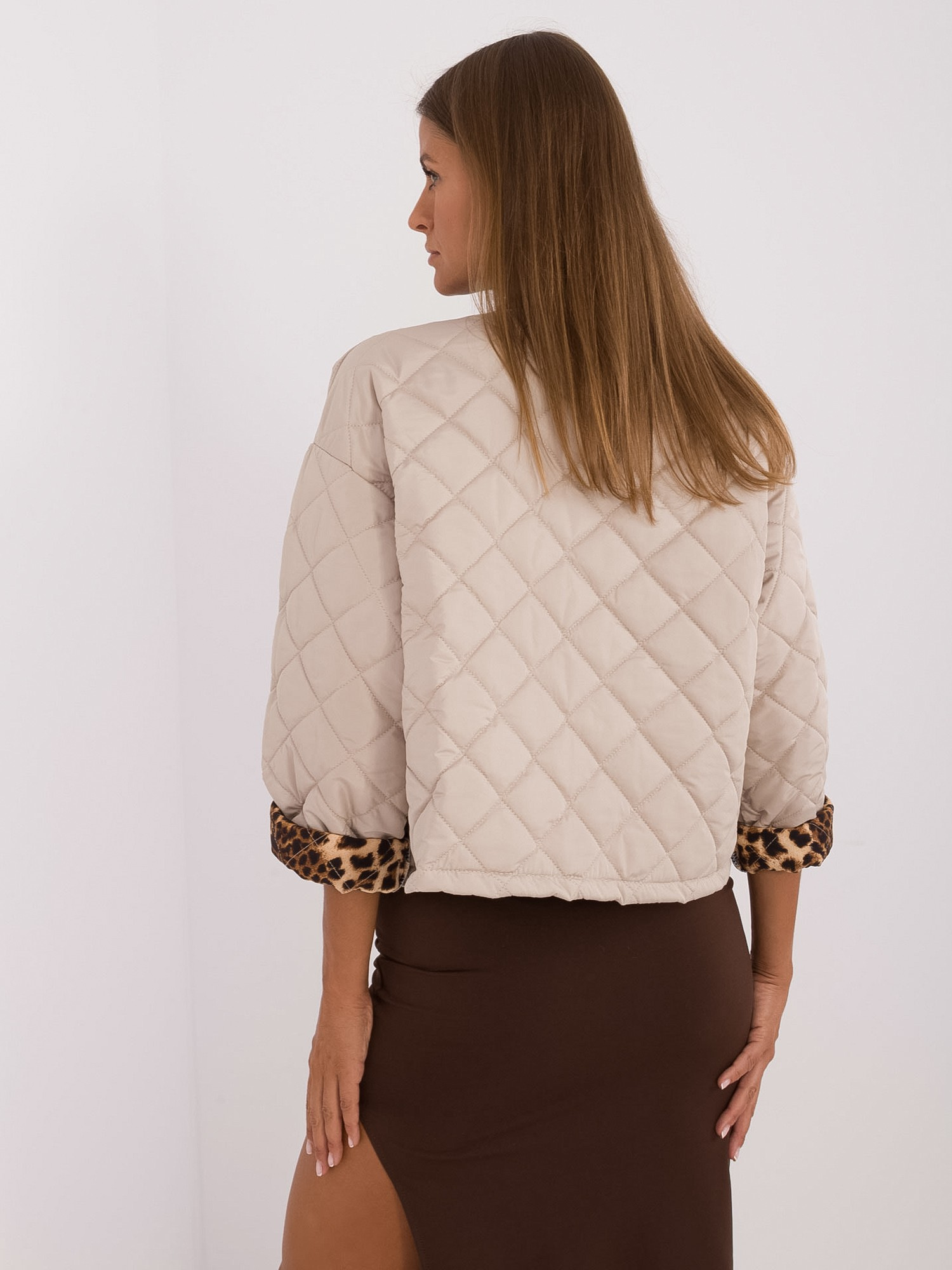 Hurt Beige transitional jacket with leopard lining.
