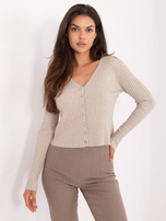 Beige sweater with flower-shaped buttons.