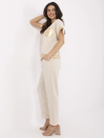 Hurt Beżowy damski komplet z błyszczącymi wstawkami