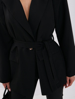 Black women's blazer with a fabric belt.