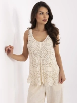 Beige lace blouse with straps.