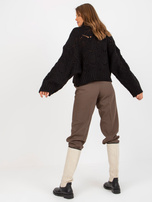 Hurtownia Czarny luźny sweter z golfem w ażurowy wzór