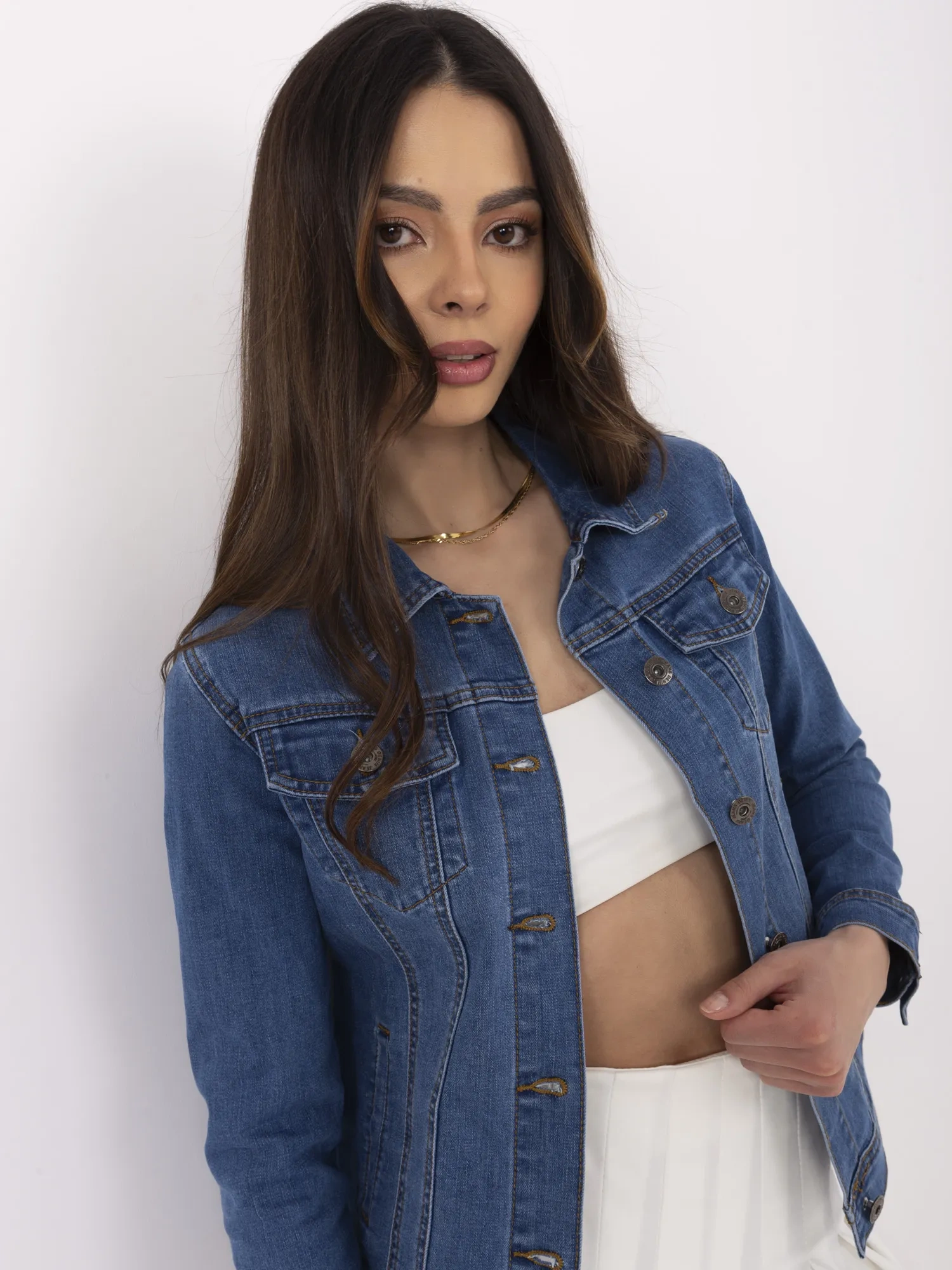 Blue women's denim jacket with a collar.