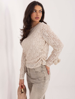 Jasnobeżowa dopasowana bluzka z koronką