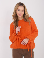 Pomarańczowy sweter oversize ze ściągaczami