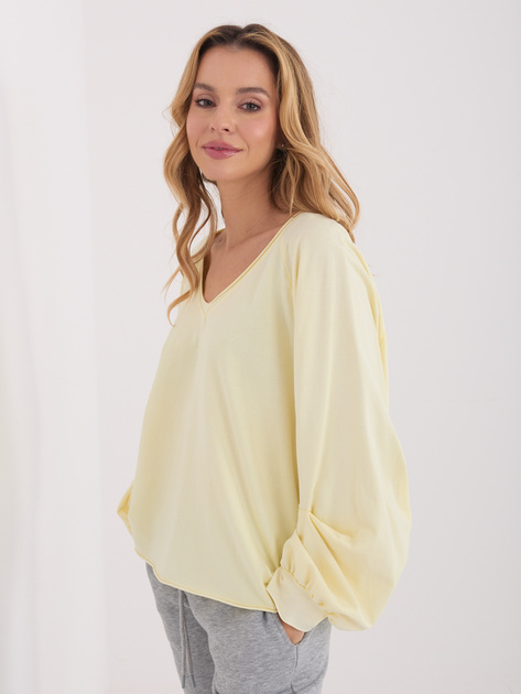 Jasnożółta bluzka oversize z bufiastym rękawem