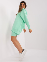 Mint casual set with a long sweatshirt.