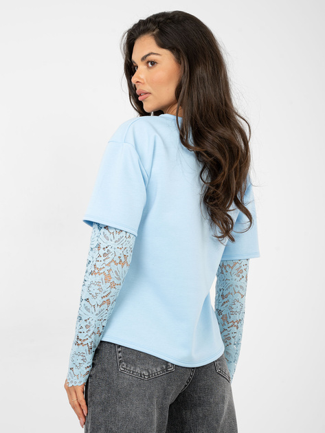 Jasnoniebieska bluzka oversize z koronką