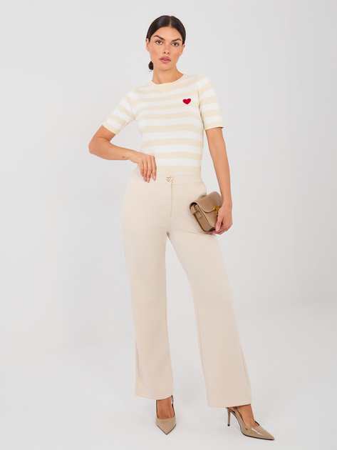 Jasnobeżowy damski sweter w paski