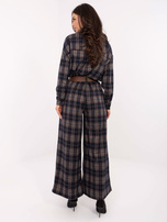 Navy blue palazzo pants from the set.