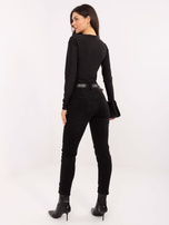 Czarne jeansy skinny ze średnim stanem 