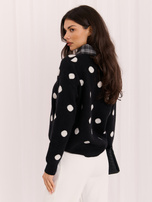 Schwarzer Damen Oversize-Pullover mit Punkten.