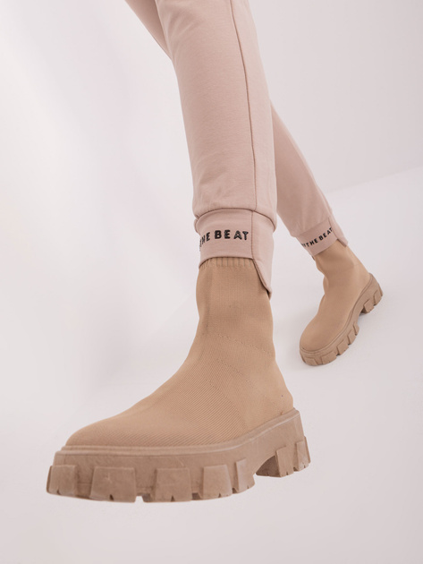 Hurt Beżowe damskie spodnie dresowe z napisami c