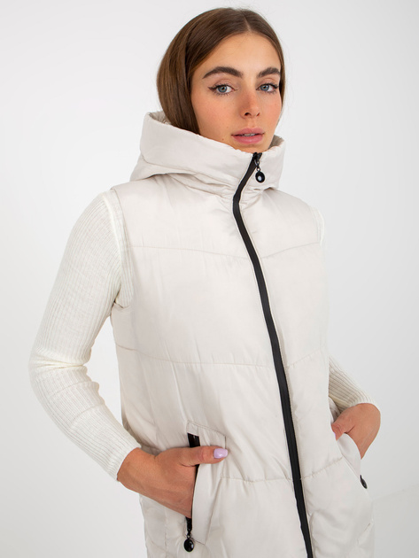 Hurtownia Kremowa długa kamizelka puchowa z kapturem