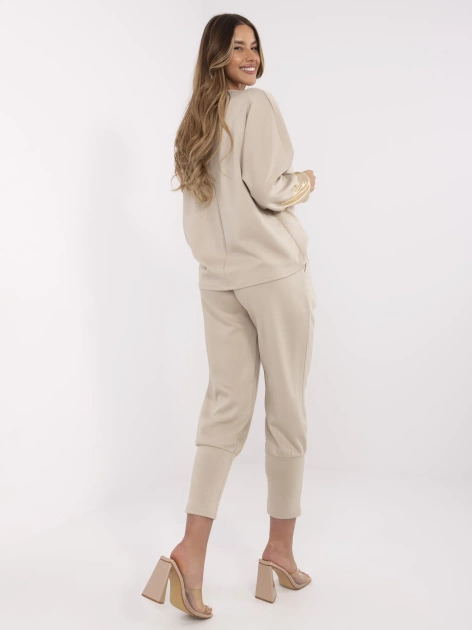 Beżowy damski komplet z błyszczącymi wstawkami