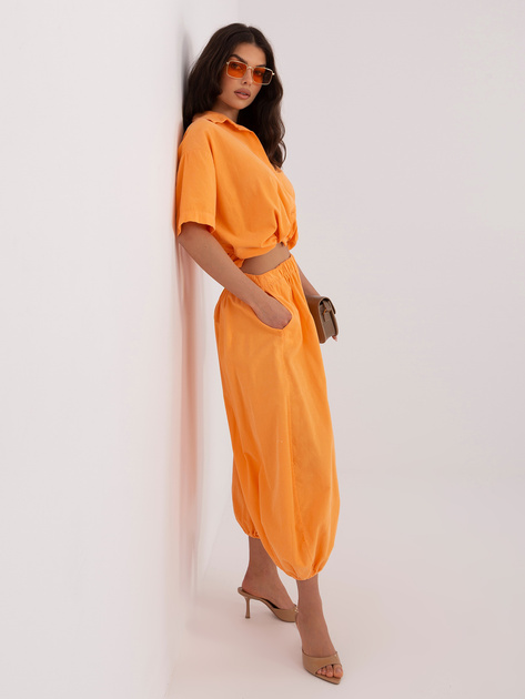 Jasnopomarańczowe sztruksowe spodnie od kompletu