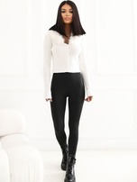 Ecru short sweater with button closure.