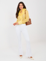 Białe jeansowe spodnie dzwony  