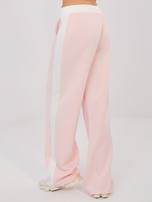 Jasnoróżowe dresowe spodnie z lampasami RUE PARIS 