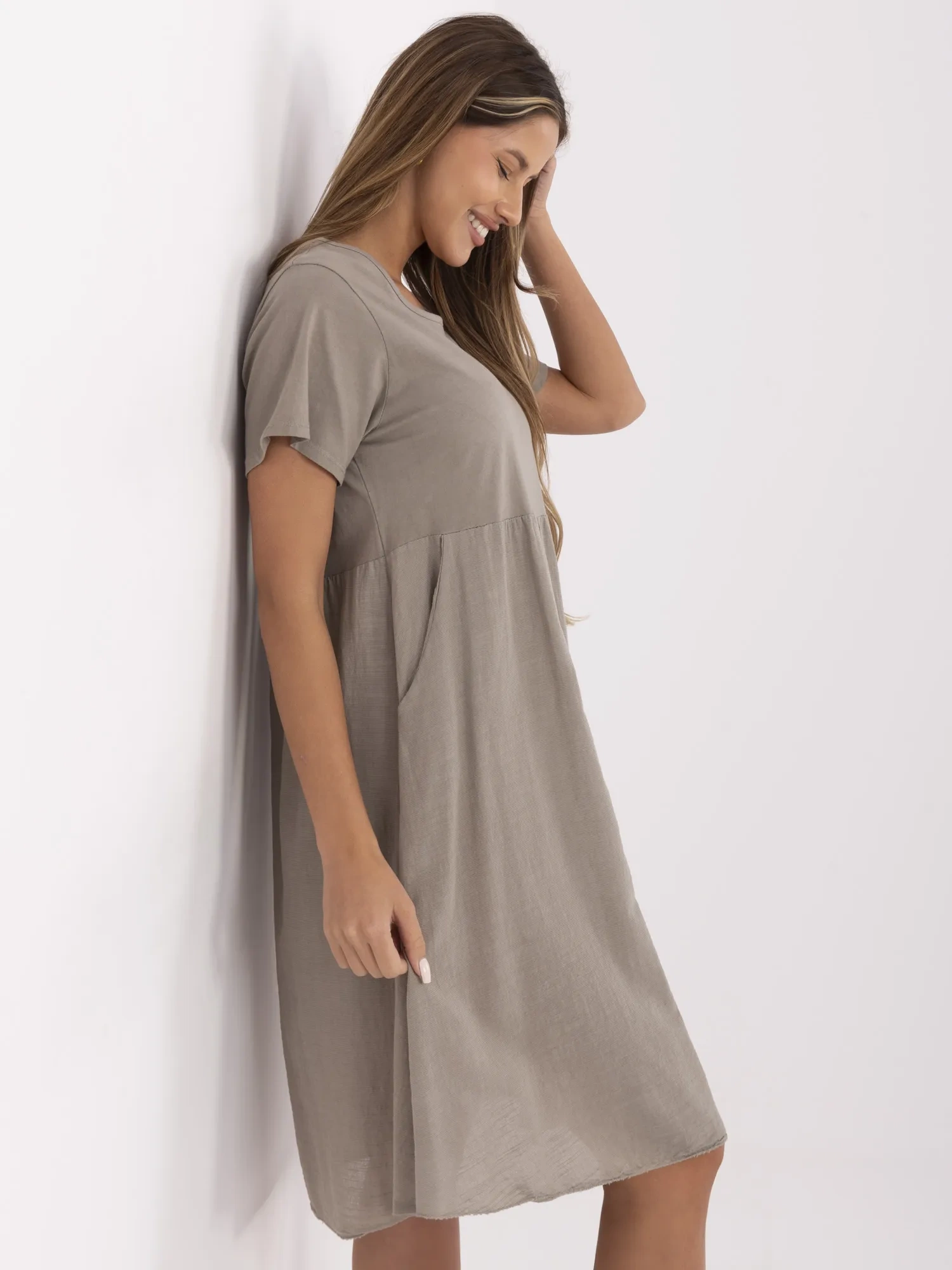 Dark beige summer dress with pockets.