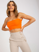 Beżowe eleganckie spodnie z materiału z kieszeniami