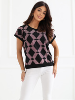 Black blouse with a geometric pattern.
