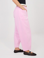 Pastelowe różowe sztruksowe spodnie bez zapięcia