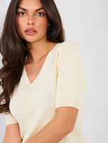 Jasnobeżowy damski sweter z dekoltem V