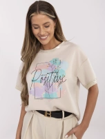 Beżowa bluzka z błyszczącymi wstawkami 