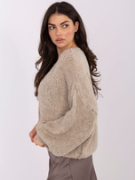 Beżowy sweter oversize w jednolitym kolorze