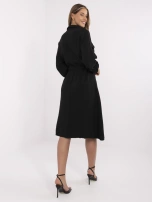 Black muslin dress with a drawstring at the waist.
