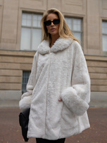 Ecru oversized fur coat with a decorative collar.