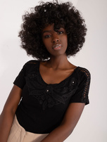 Wholesale Black blouse with lace at the neckline.