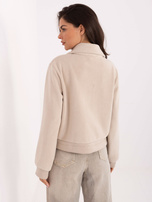 Jasnobeżowa polarowa kurtka z kołnierzykiem