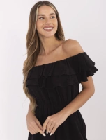 Black muslin jumpsuit with shorts.