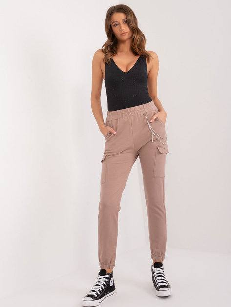 Hurtownia Ciemnobeżowe spodnie damskie dresowe ze ściągaczami