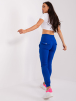 Hurtownia Kobaltowe spodnie dresowe z kieszeniami