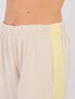 Jasnobeżowy dwuczęściowy komplet ze spodniami RUE PARIS 