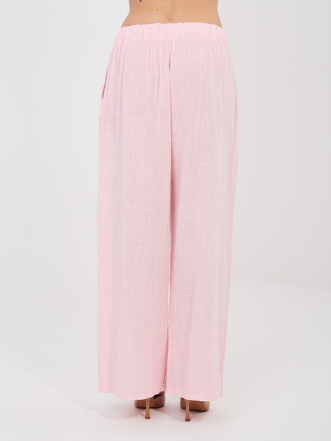 Jasnoróżowe letnie spodnie z wiązaniem
