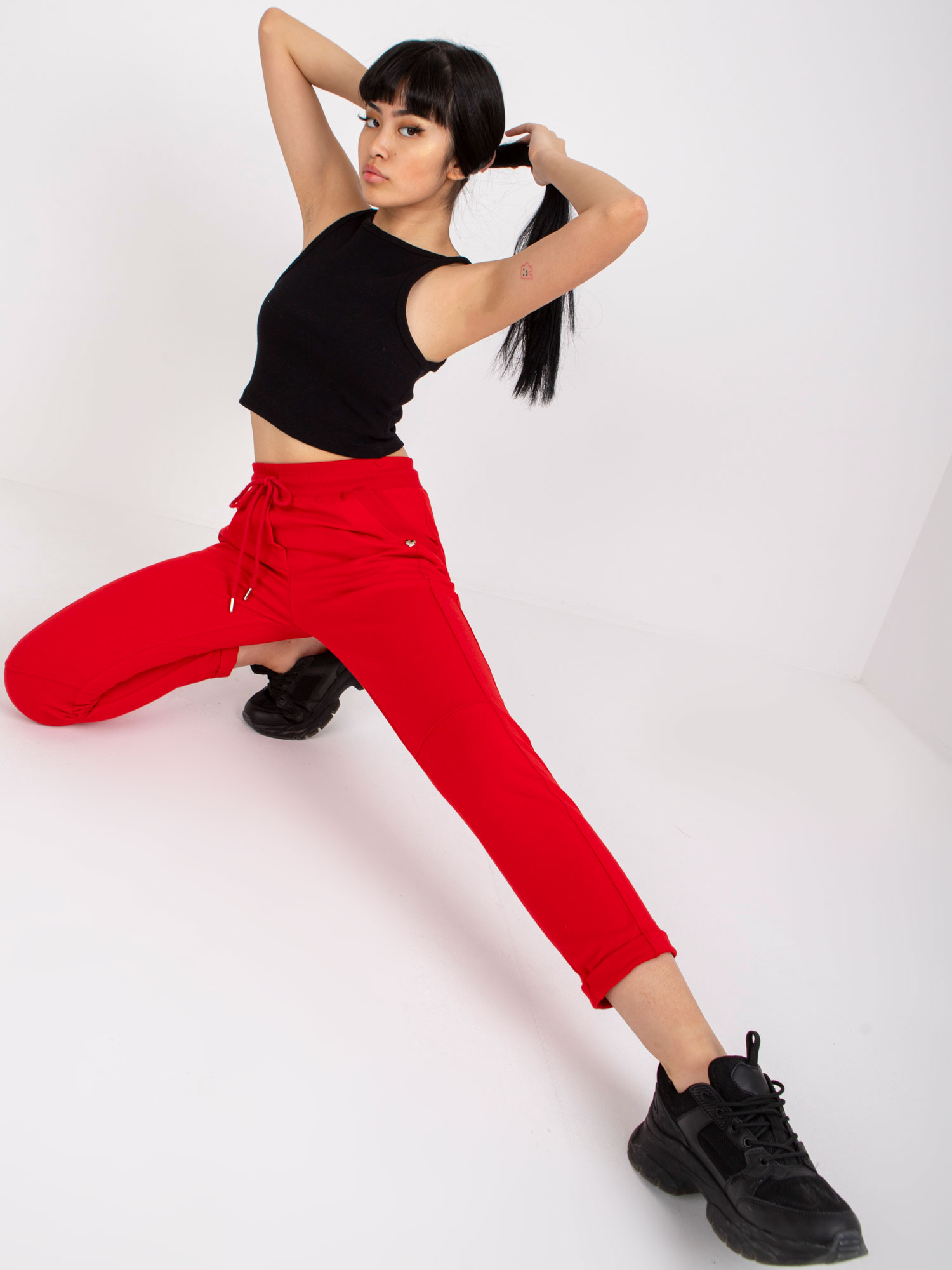 Red basic sweatpants with pockets.