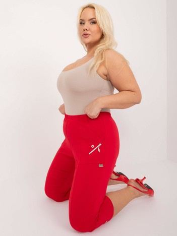 Hurtownia Czerwone dopasowane spodnie 3/4 plus size